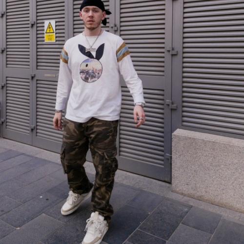 Артист Huzzy B